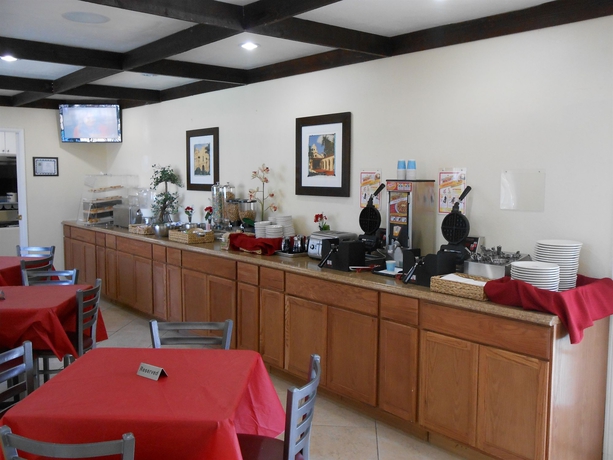 Imagen del bar/restaurante del Hotel Best Inn and Suites. Foto 7