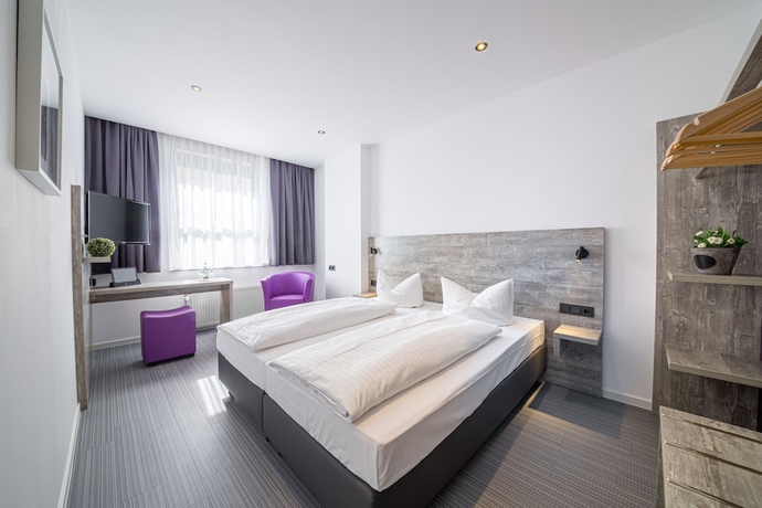 Imagen de la habitación del Hotel Best Living Arotel. Foto 3