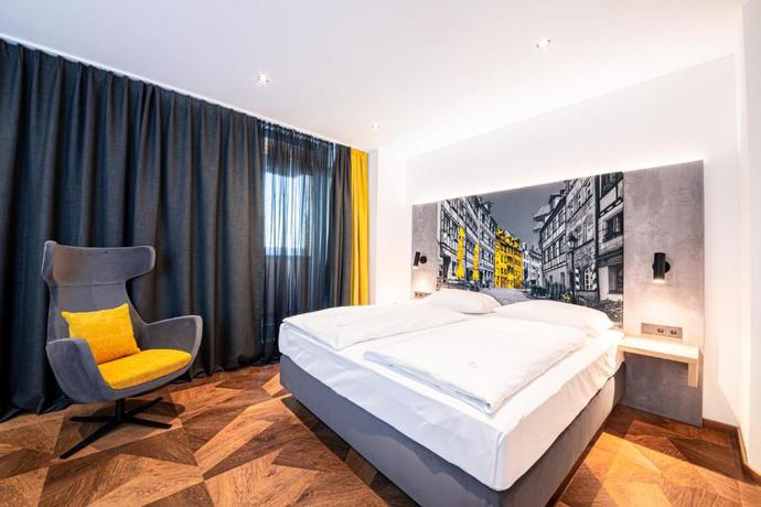 Imagen de la habitación del Hotel Best Living Arotel. Foto 2