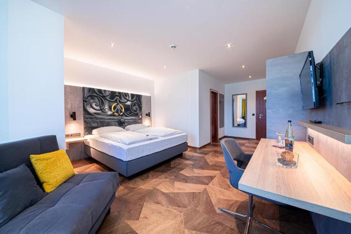 Imagen de la habitación del Hotel Best Living Arotel. Foto 5