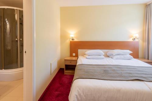Imagen de la habitación del Hotel Best Palanga. Foto 17