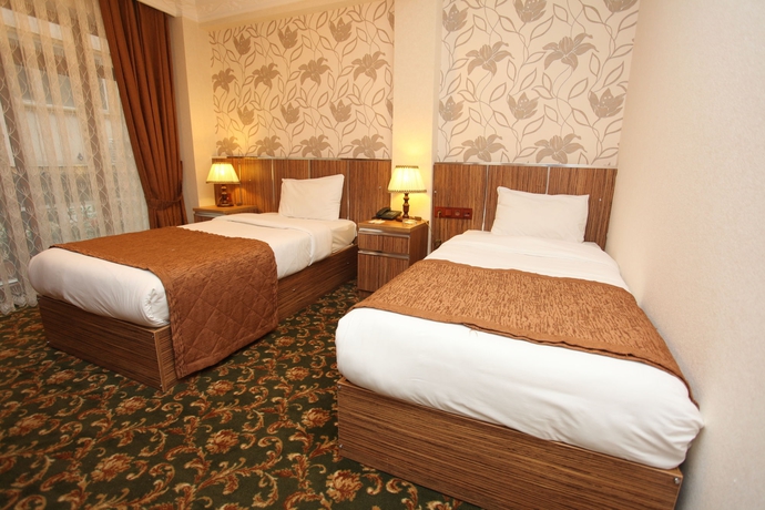 Imagen de la habitación del Hotel Best Town. Foto 4