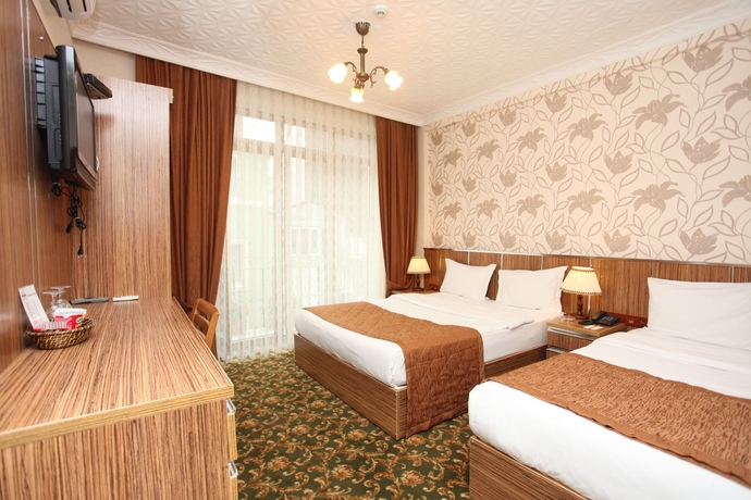 Imagen de la habitación del Hotel Best Town. Foto 5