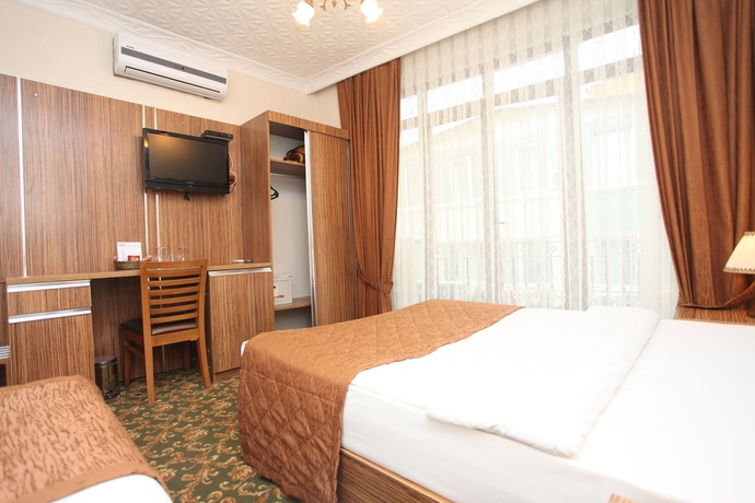 Imagen de la habitación del Hotel Best Town. Foto 8
