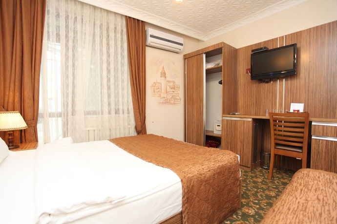 Imagen de la habitación del Hotel Best Town. Foto 9