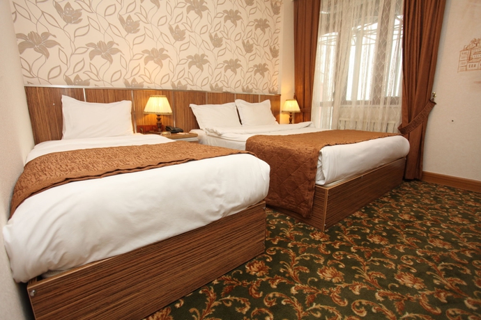 Imagen de la habitación del Hotel Best Town. Foto 10