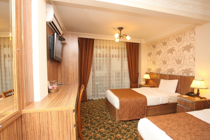 Imagen de la habitación del Hotel Best Town. Foto 11