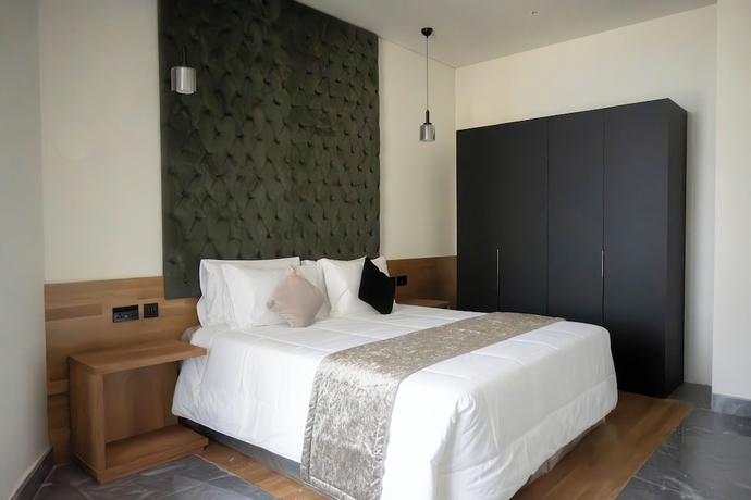 Imagen de la habitación del Hotel Best View Fortina Luxury Suites. Foto 6
