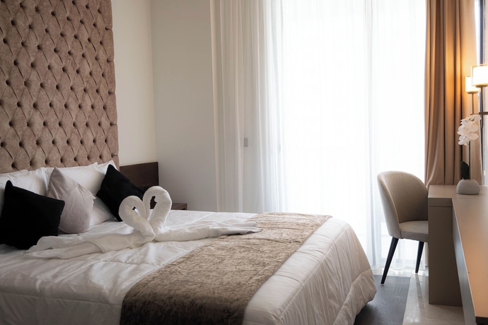 Imagen de la habitación del Hotel Best View Fortina Luxury Suites. Foto 8