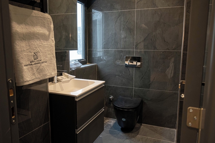 Imagen de la habitación del Hotel Best View Fortina Luxury Suites. Foto 12