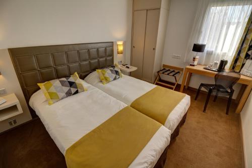 Imagen de la habitación del Hotel Best Western Atrium. Foto 7