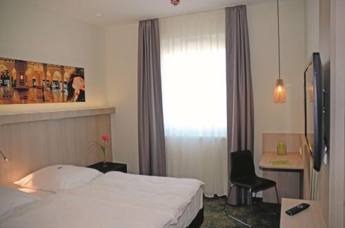 Imagen de la habitación del Hotel Best Western Bad Rappenau. Foto 9