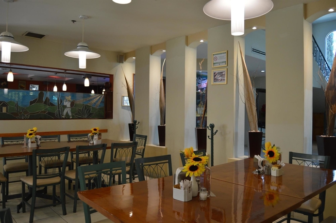 Imagen del bar/restaurante del Hotel Best Western Bazarell Inn. Foto 6