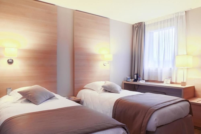 Imagen de la habitación del Hotel Best Western Bourgoin Jallieu. Foto 10