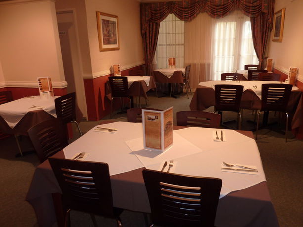 Imagen del bar/restaurante del Hotel Best Western Coachman's Inn Motel. Foto 5