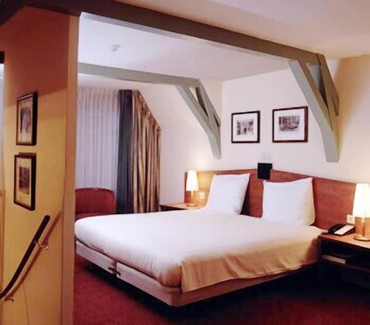 Imagen de la habitación del Hotel Best Western Dam Square Inn. Foto 3