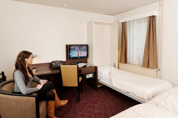 Imagen de la habitación del Hotel Best Western Dam Square Inn. Foto 4
