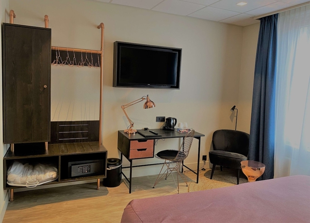 Imagen de la habitación del Hotel Best Western Dam Square Inn. Foto 13