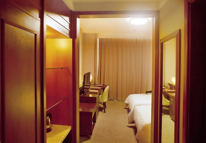 Imagen de la habitación del Hotel Best Western Harbin Fortune. Foto 17