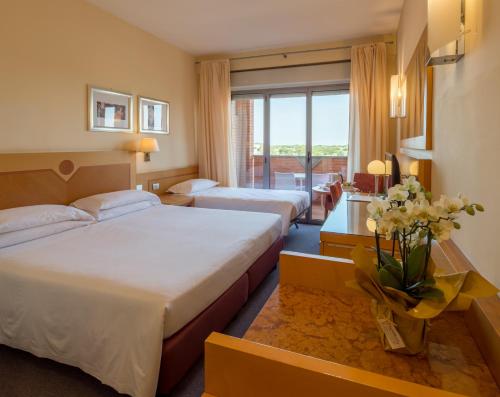 Imagen de la habitación del Hotel Best Western Hotel I Triangoli. Foto 10