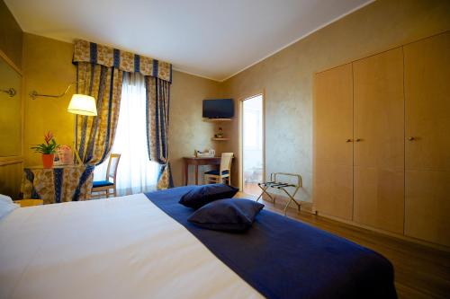 Imagen de la habitación del Hotel Best Western Luxor. Foto 3