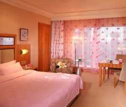 Imagen de la habitación del Hotel Best Western Mayflowers Wuhan. Foto 10