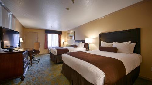 Imagen de la habitación del Hotel Best Western Plus Executive Suites. Foto 9