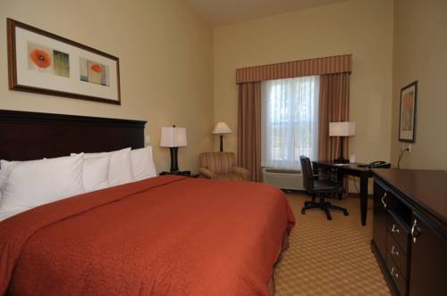 Imagen de la habitación del Hotel Best Western Plus First Coast Inn and Suites. Foto 3