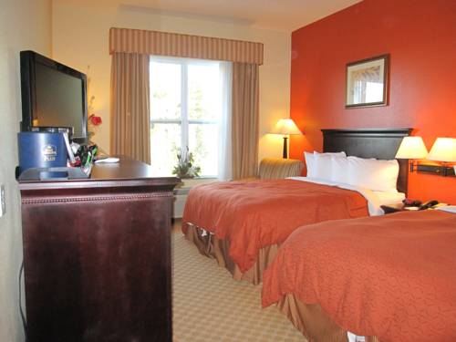 Imagen de la habitación del Hotel Best Western Plus First Coast Inn and Suites. Foto 9