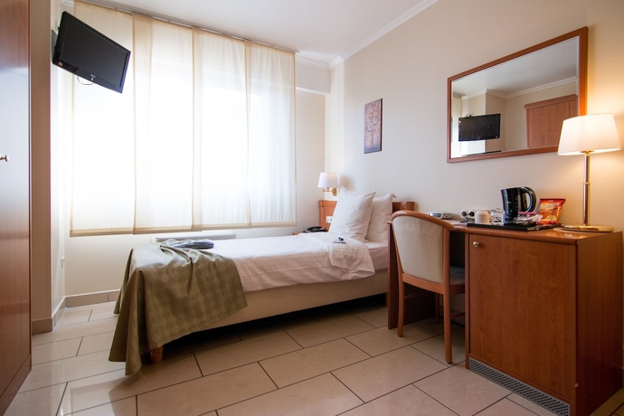 Imagen de la habitación del Hotel Best Western Plus Grand Hotel Victor Hugo. Foto 2