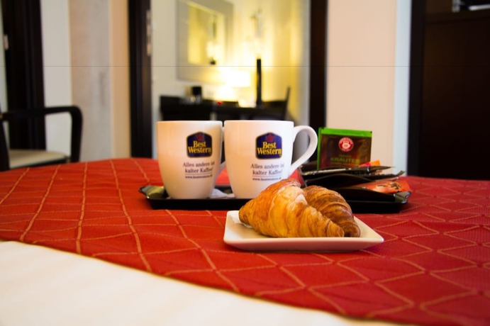 Imagen de la habitación del Hotel Best Western Plus Grand Hotel Victor Hugo. Foto 10