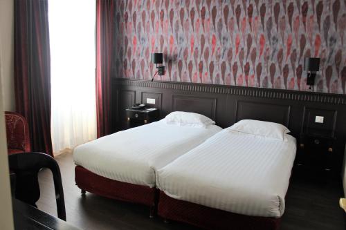Imagen de la habitación del Hotel Best Western Plus H&ocirc;tel d'Angleterre. Foto 4