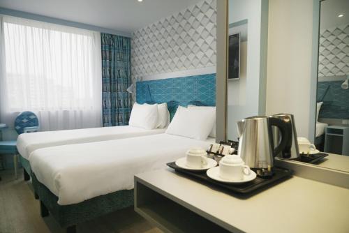 Imagen de la habitación del Hotel Best Western Plus London Wembley. Foto 8