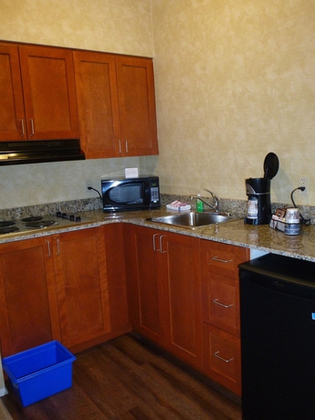 Imagen de la habitación del Hotel Best Western Plus Rose City Suites. Foto 2