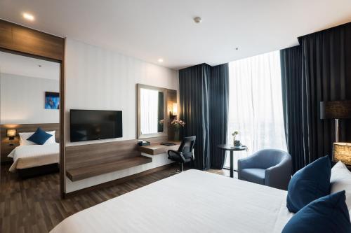 Imagen de la habitación del Hotel Best Western Plus Wanda Grand. Foto 7