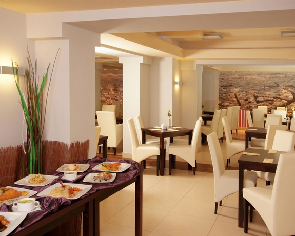 Imagen del bar/restaurante del Hotel Best Western Portos. Foto 7