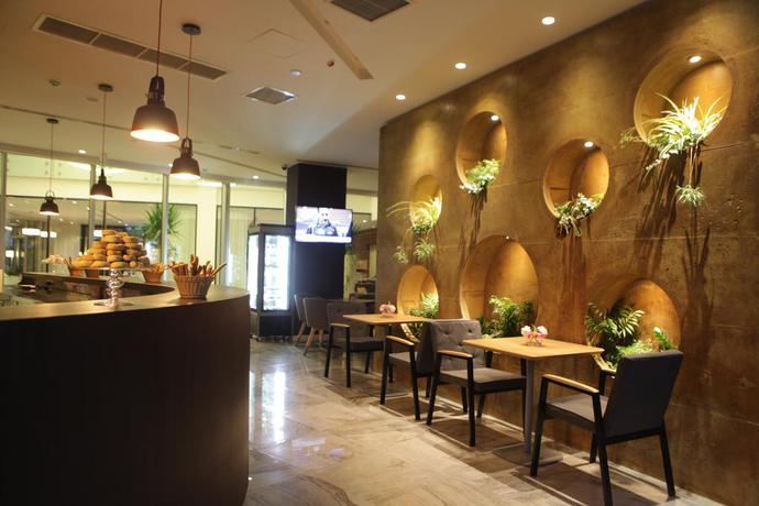 Imagen del bar/restaurante del Hotel Best Western Premier Ark. Foto 2