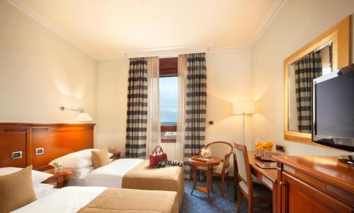 Imagen de la habitación del Hotel Best Western Premier Astoria. Foto 3