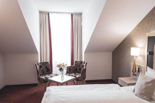Imagen de la habitación del Hotel Best Western Premier Bayerischer Hof Miesbach. Foto 7