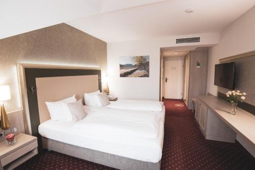 Imagen de la habitación del Hotel Best Western Premier Bayerischer Hof Miesbach. Foto 9
