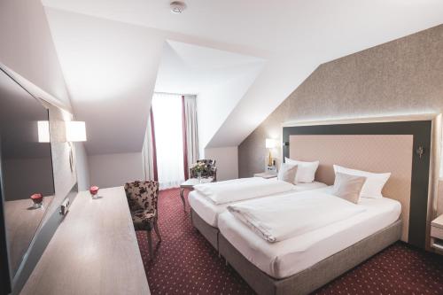 Imagen de la habitación del Hotel Best Western Premier Bayerischer Hof Miesbach. Foto 10