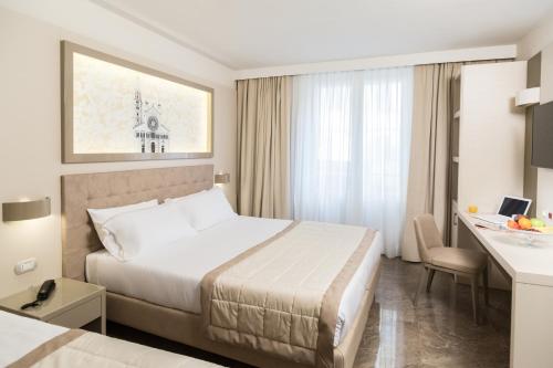 Imagen de la habitación del Hotel Best Western Premier Milano Palace. Foto 7