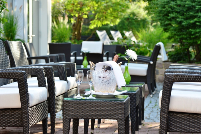 Imagen de los exteriores del Hotel Best Western Premier Parkhotel Kronsberg. Foto 9