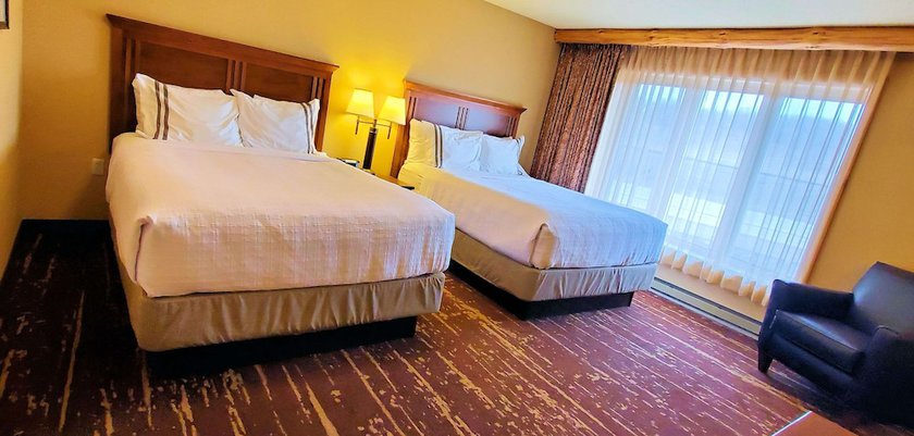 Imagen de la habitación del Hotel Best Western Premier The Lodge On Lake Detroit. Foto 12