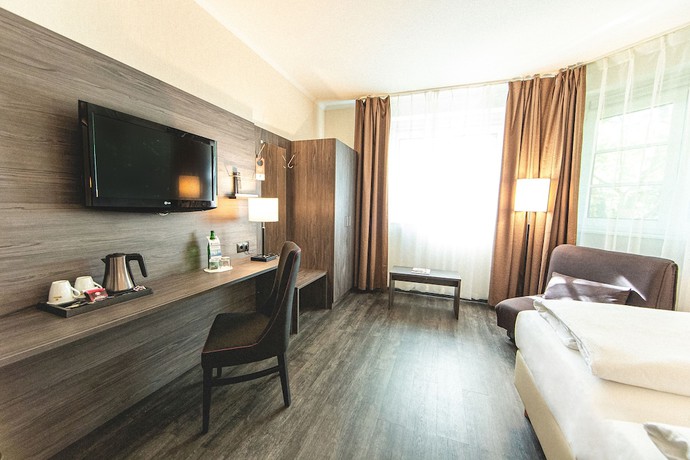 Imagen de la habitación del Hotel Best Western Schmoeker-hof. Foto 13