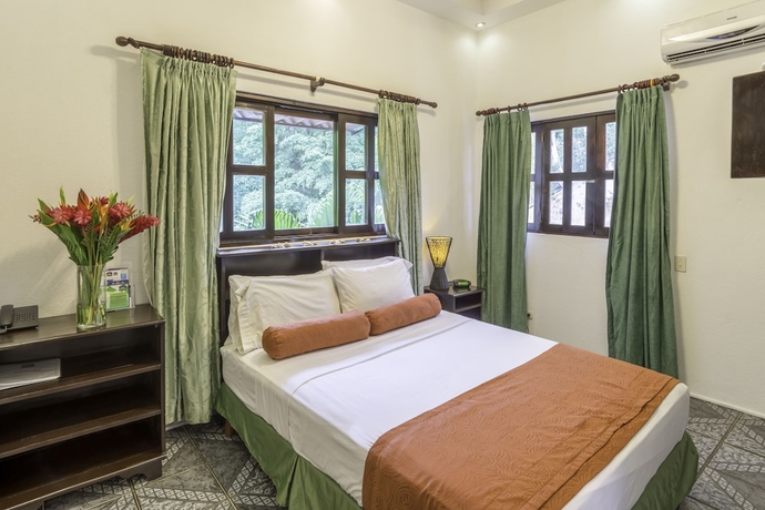 Imagen de la habitación del Hotel Best Western Tamarindo Vista Villas. Foto 7