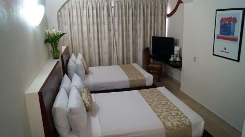 Imagen de la habitación del Hotel Best Western Taxco. Foto 7