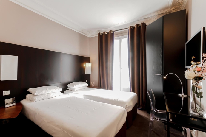 Imagen de la habitación del Hotel Best Western The Blake Paris Gare Saint Lazare. Foto 3