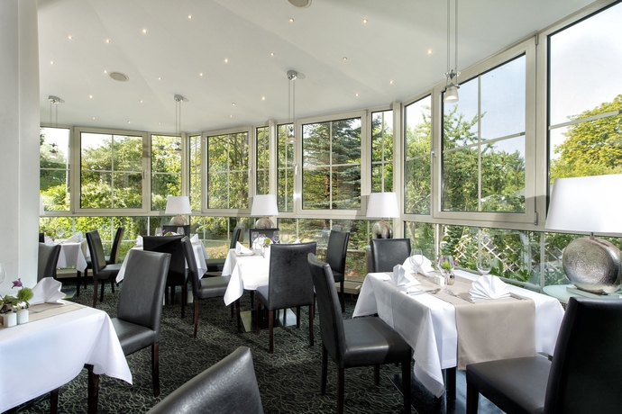 Imagen del bar/restaurante del Hotel Best Western Windorf. Foto 2