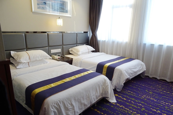 Imagen de la habitación del Hotel Best Western Yantai. Foto 16